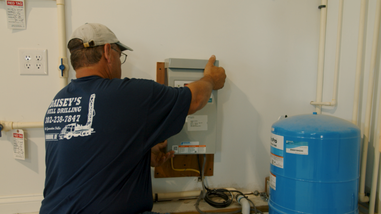 An employee installing a Goulds pump